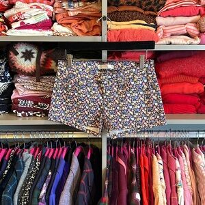 Levi’s purple/navy/pink flowered 2 1/2” size 26 shorts​